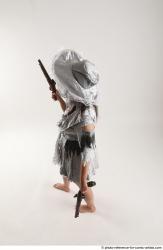 LUCI_AVIOL STANDING POSE WITH TWO GUNS 